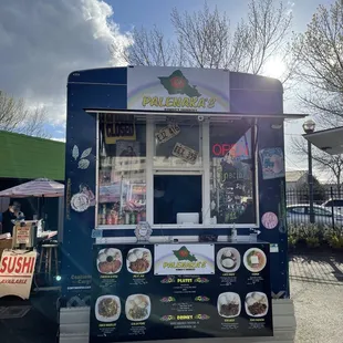 a food truck parked in a parking lot