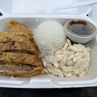 a meal in a styrofoam container