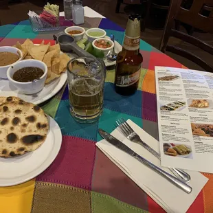 Chips and salsa, beer and menu