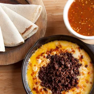 Choriqueso
Melted cheese with Mexican Chorizo