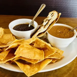 Complimentary chips, tortillas, salsa and bean purée
