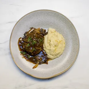 Bison Salisbury Steak with Mushroom Gravy and Onion Confit Cauliflower Mashers