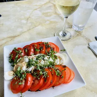 Caprese salad and a glass of white wine!