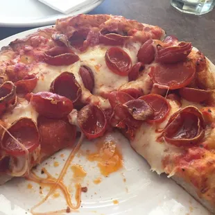 Lunch 9&quot; with double spicy pepperoni (partially devoured).  This plus a salad is $6.95 (+$1-ish for the 2nd topping).  Worth it!