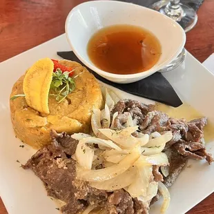 Puerto Rican Bistec (Biftec Encebollado) This is a Puerto Rican take of &quot;Steak &amp; Onion&quot;, our juicy thin sliced Sirloin cooked in onions
