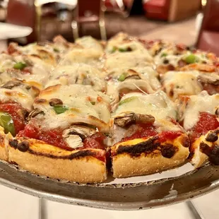 a pizza on a serving tray