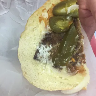 One side of a beef milenesa torta (requested no ham). Where's the rest of the beef? No avocado?