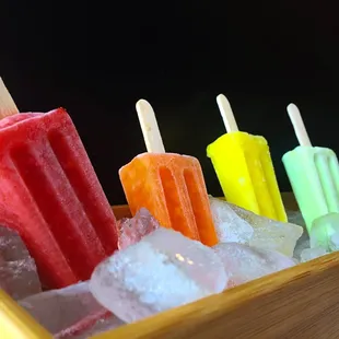 a row of pops in ice