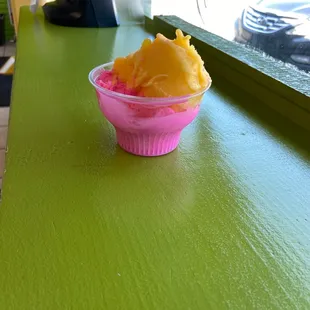 Mango sherbet and cotton candy ice cream - my son is in Heaven - at least when he&apos;s not having Brain freeze .