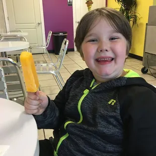 My little guy with his mango paleta. Yum!