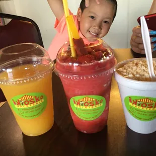 Fresh orange juice, Strawberry Volcan and elotes