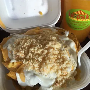 Tostilocos with sour cream cheese and corn. Yummy