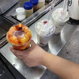 a person holding a donut