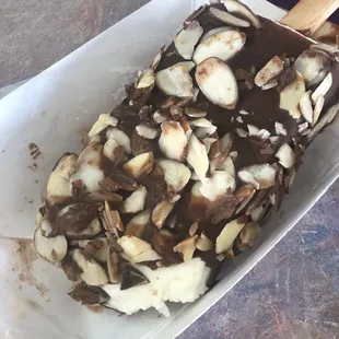 Coconut Paleta dipped and nutted to perfection