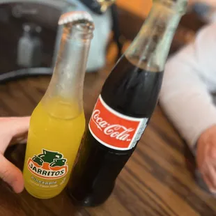 two bottles of soda