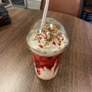 a smoothie in a plastic cup