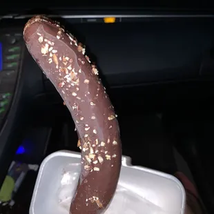 Chocolate covered frozen banana, healthy delicious treat