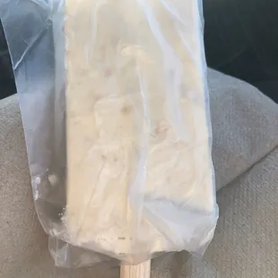 a piece of cheese on a stick