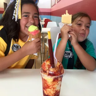 My kids enjoying some ice cream after their soccer games.