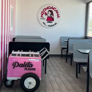 a pink ice cream cart
