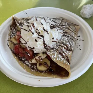 Traditional Crepe with Nutella, Whipped Cream, Strawberries, Bananas &amp; Powdered Sugar.