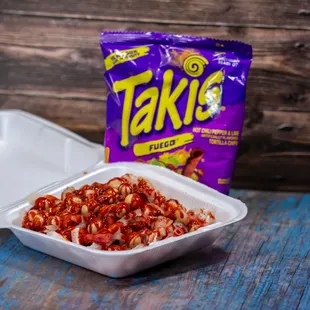 a take out container of tastys