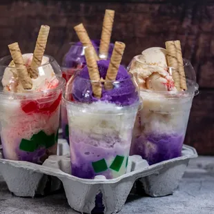three ice cream sundaes in a carton