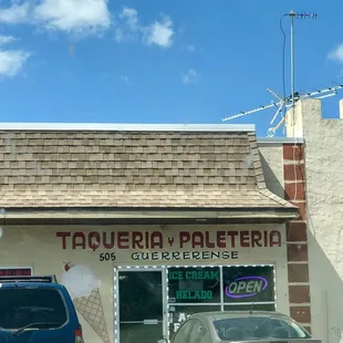 cars parked in front of a building