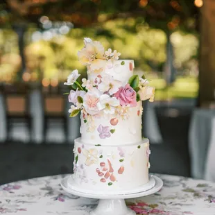 Our beautiful wedding cake by Palette Cakes. Photo by Janine Licare.