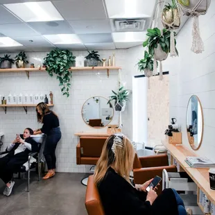 a woman getting her hair done