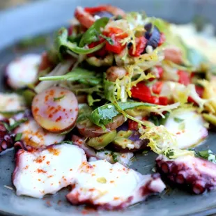 a plate of octopus salad