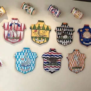 a collection of decorative cups and mugs