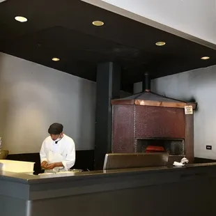 a chef preparing food in a restaurant
