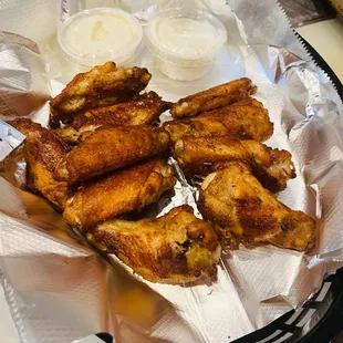 a basket of chicken wings