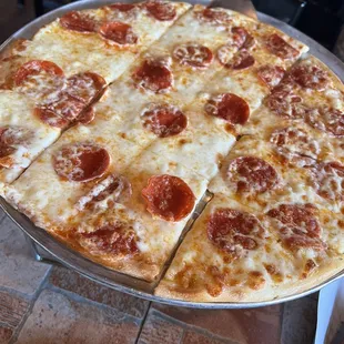 Large pizza with Alfredo and pepperoni