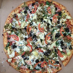 Extra large Mediterranean pizza with added olives (I think.)