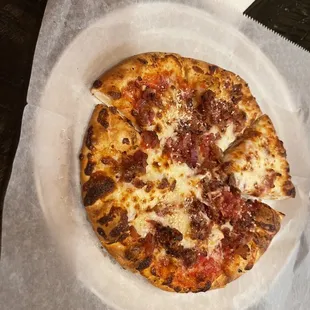 Kid Pizza with bacon and cheese.