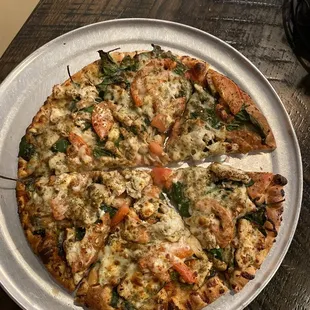 Small delicious nutty chicken pizza