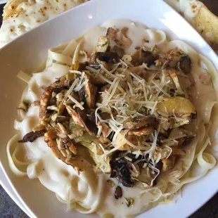 Chicken il Palio-roasted chicken, mushrooms, &amp; artichoke hearts on a bed of fettucine with alfredo sauce