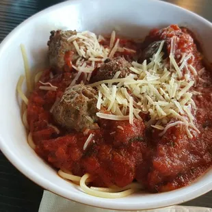 Kids menu spaghetti was supposed to be with meat sauce and added meatballs.