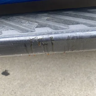 Looks like machine grease which was spread inside of my door handle obviously by the owner of the pizza cafe