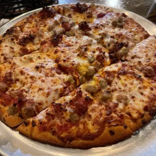 Meat and cheese deluxe pizza