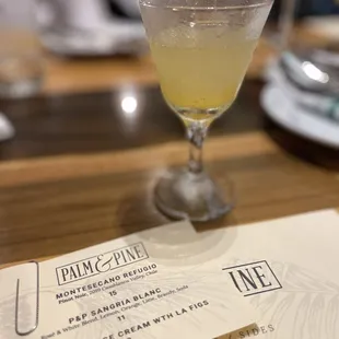 a cocktail in a glass on a table