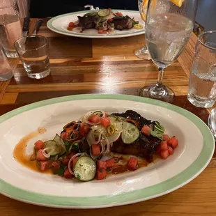 Pork shoulder with cucumber watermelon salad