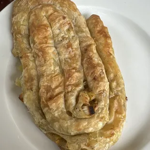 Phyllo dough pastry stuffed with seasoned potatoes