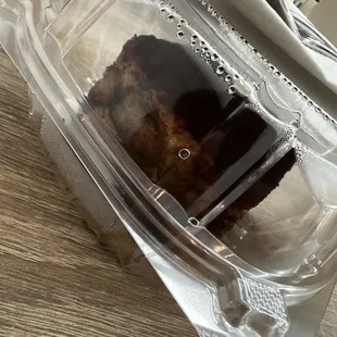 a piece of cake in a plastic container