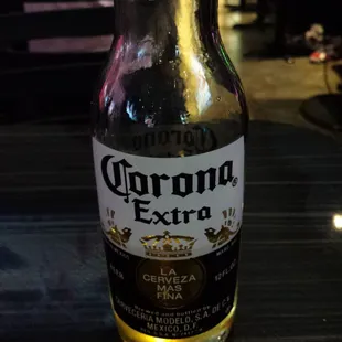 The beer is cold and served by a pretty lady