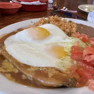 Tamale plate with sunny side eggs
