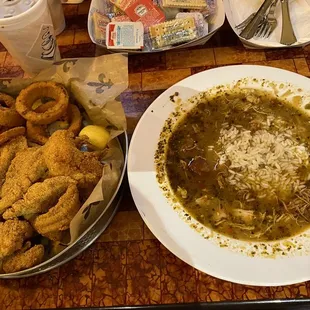 Catfish with onion rings and chicken and sausage gumbo.