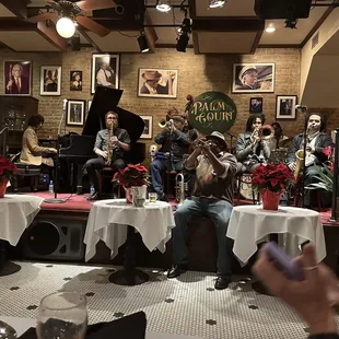 a group of people sitting around a table
